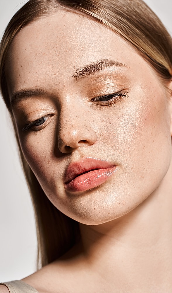 Close-up of a woman's face with natural beauty.