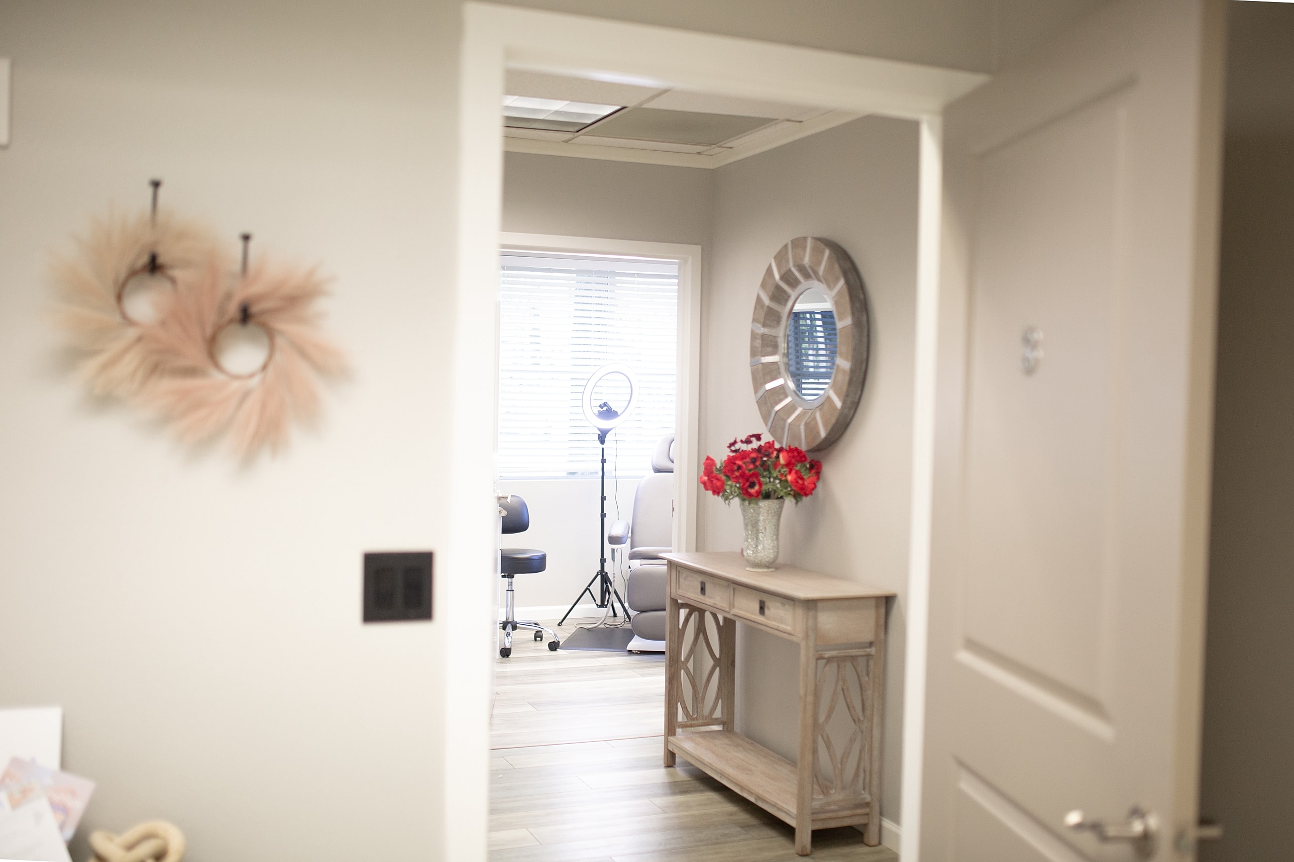 Medical office reception area with floral decor.